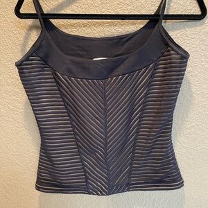 X:S,  black/ beige tank top, spaghetti straps. Top is sheer with beige underlay.